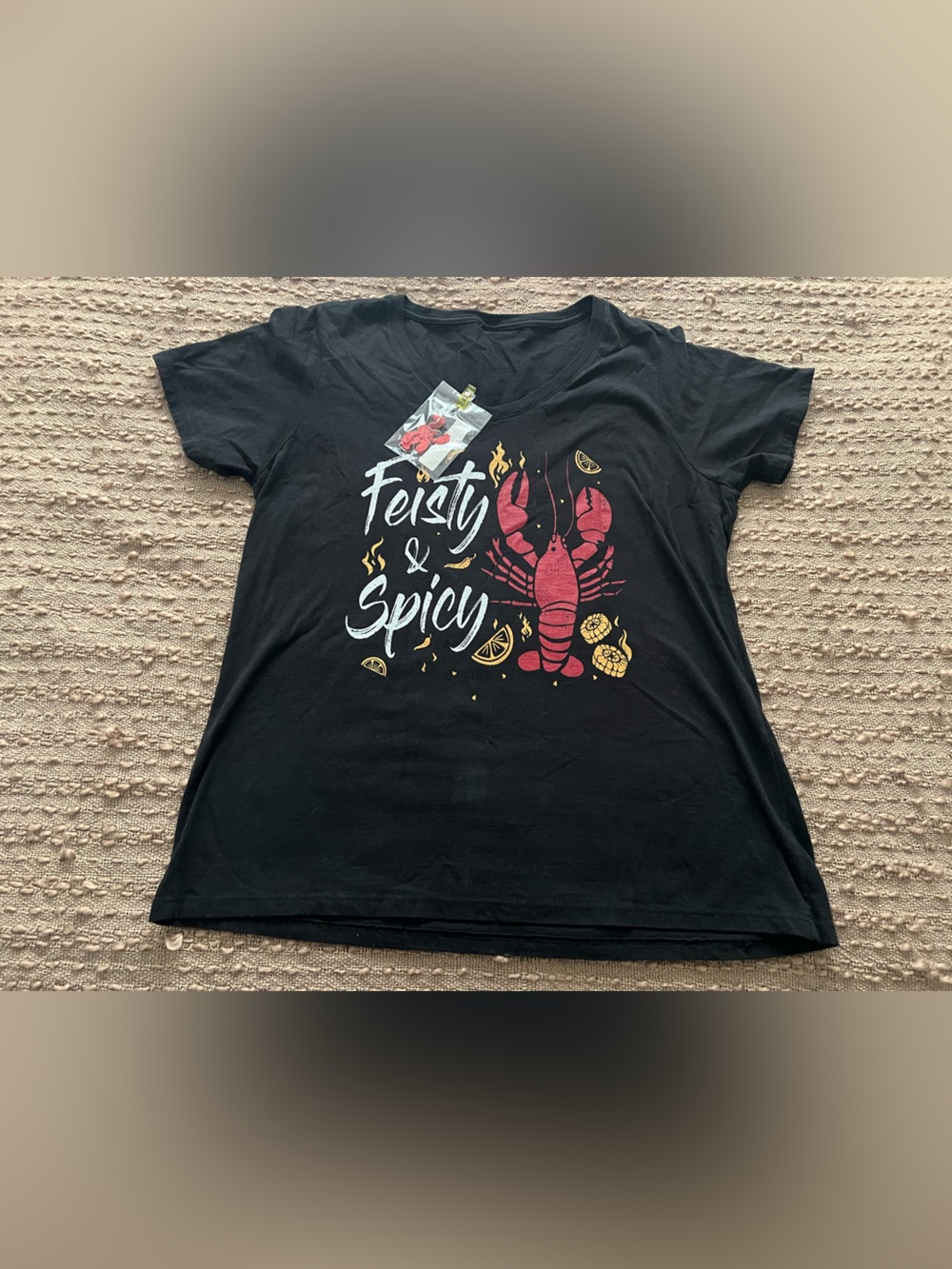 Black 'Feast & Spice' crawfish Graphic Tee with earrings